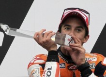 Honda MotoGP rider Marquez of Spain kisses the trophy after winning in the class race during the Czech Grand Prix in Brno